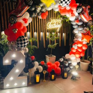 Circular balloon ring frame setup red, black, white, and silver theme